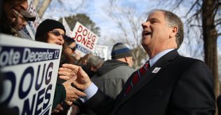 Senator Doug Jones Defends Joe Biden, Calls Harassment Allegations a Distraction